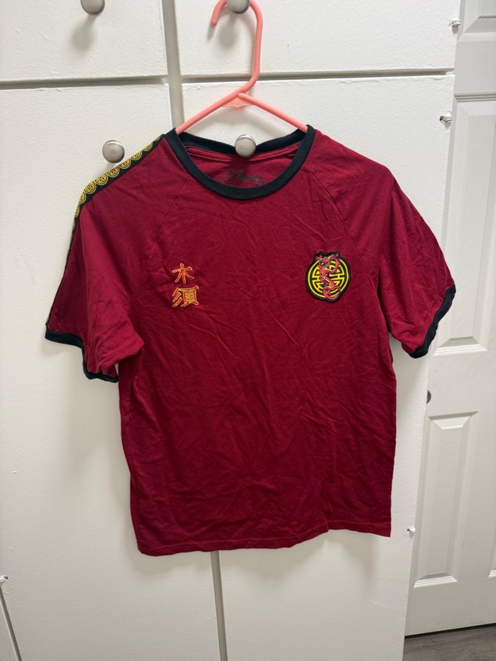 Disney Burgundy Short Sleeve Tee with Black Trim and Yellow Accents